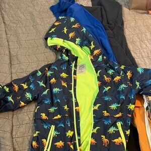 Vibrant Dinosaur Print Kids' Rain Jacket with Hood"  Description: